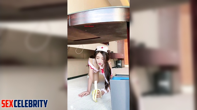 Chinese Yang Mi (中国人杨幂) as a nurse eats a banana 护士吃香蕉 [PREMIUM]